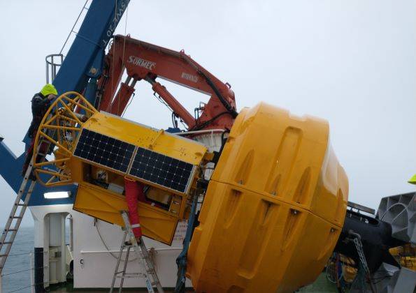 Running gas lines from the base to the top of the buoy